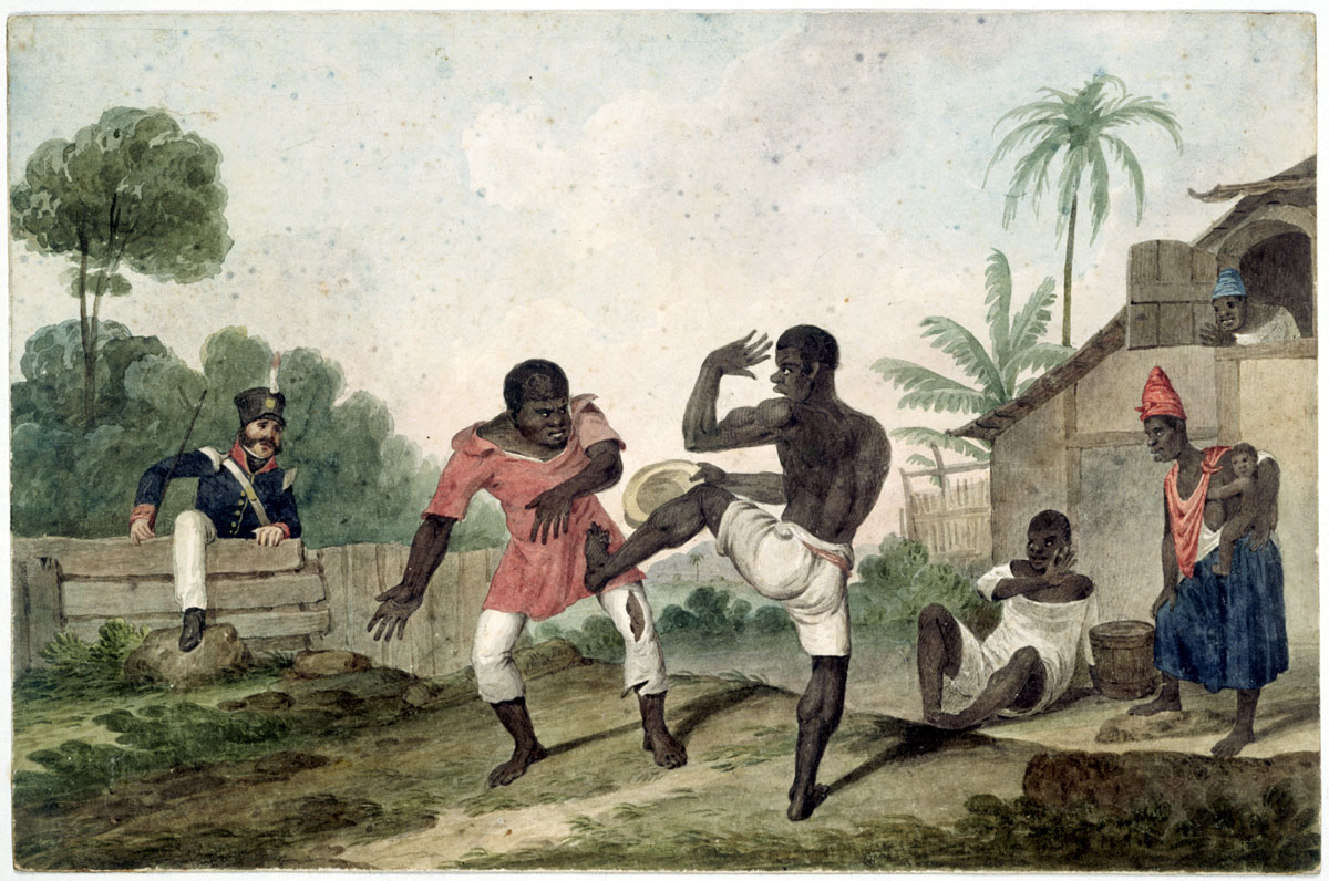 Black figures performing Capoeira