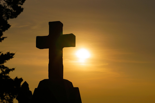 cross and a sunrise 