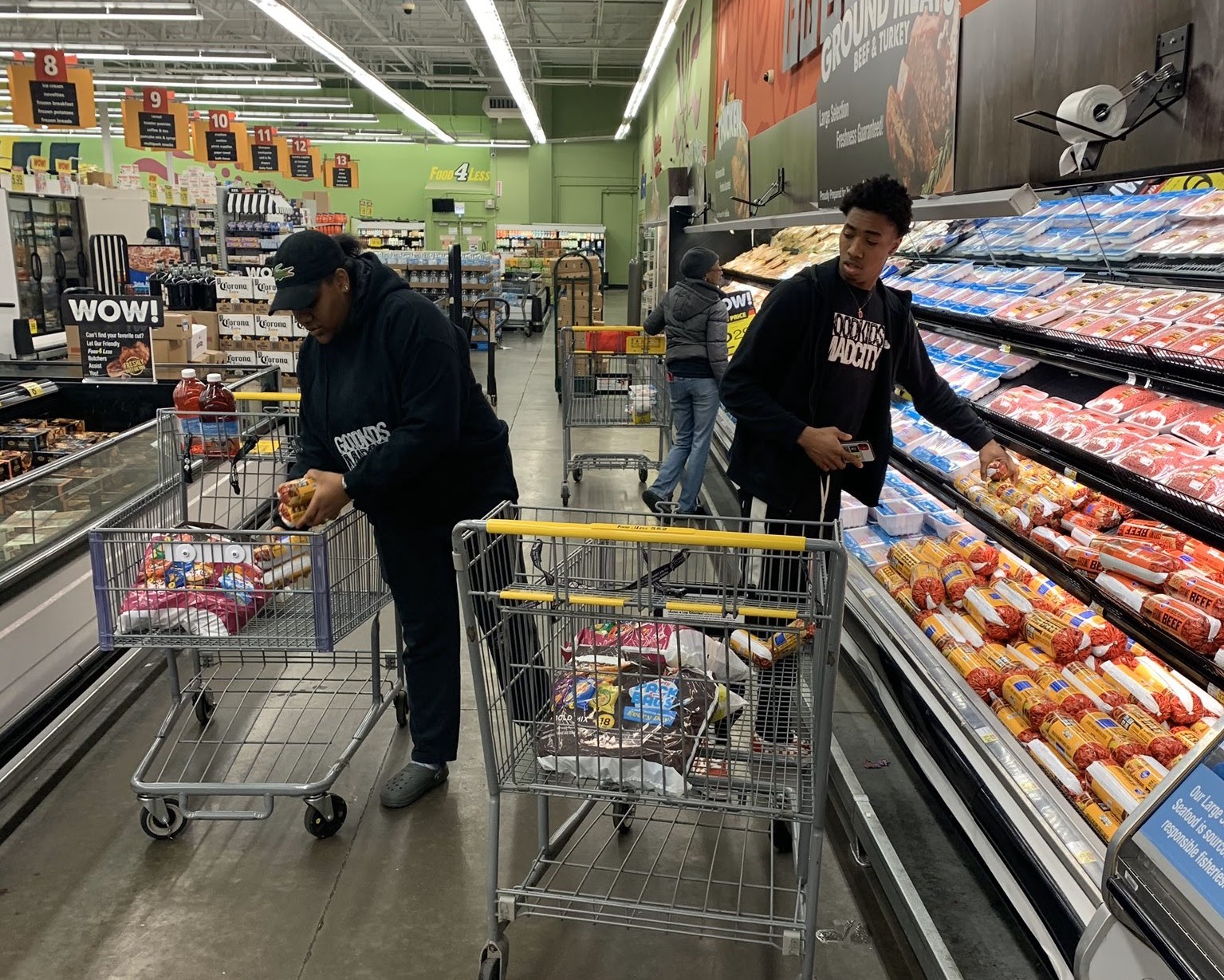 People shopping in grocery store