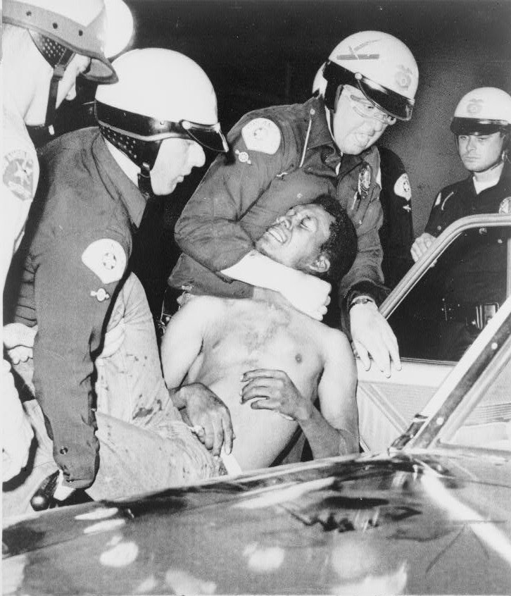 Police putting a Black man in chokehold