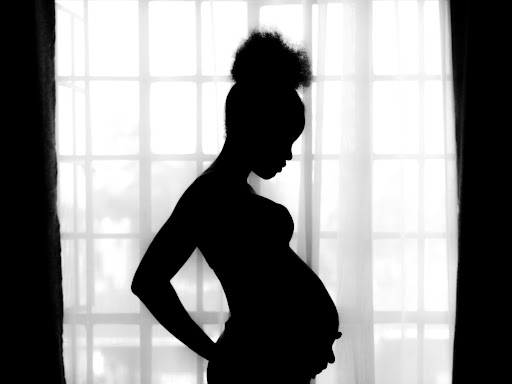 Silhouette of pregnant woman 