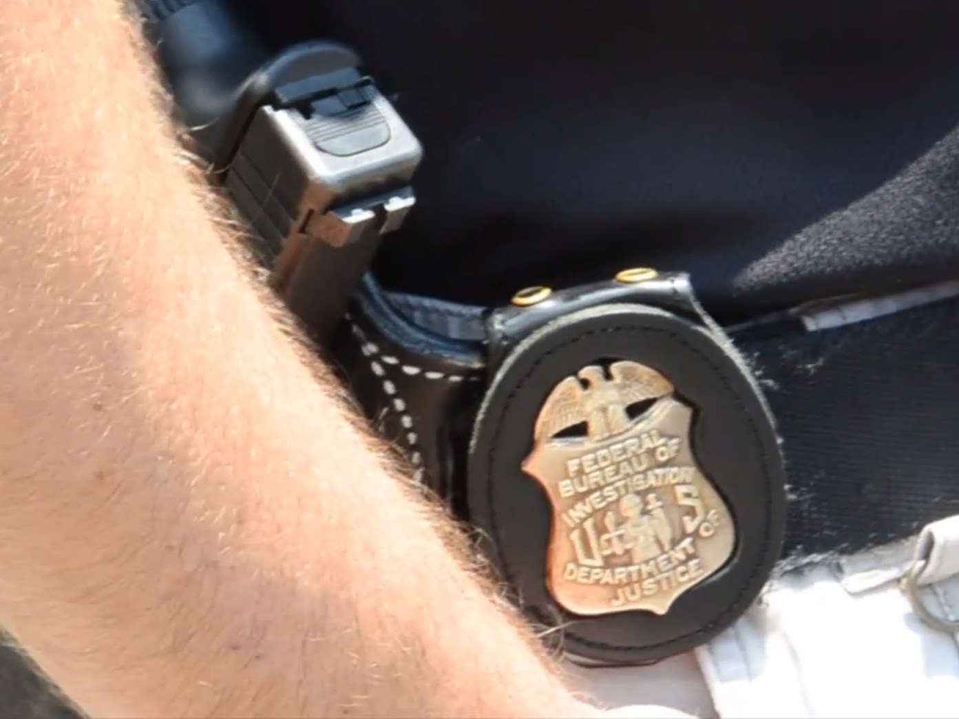 Badge on a FBI agent