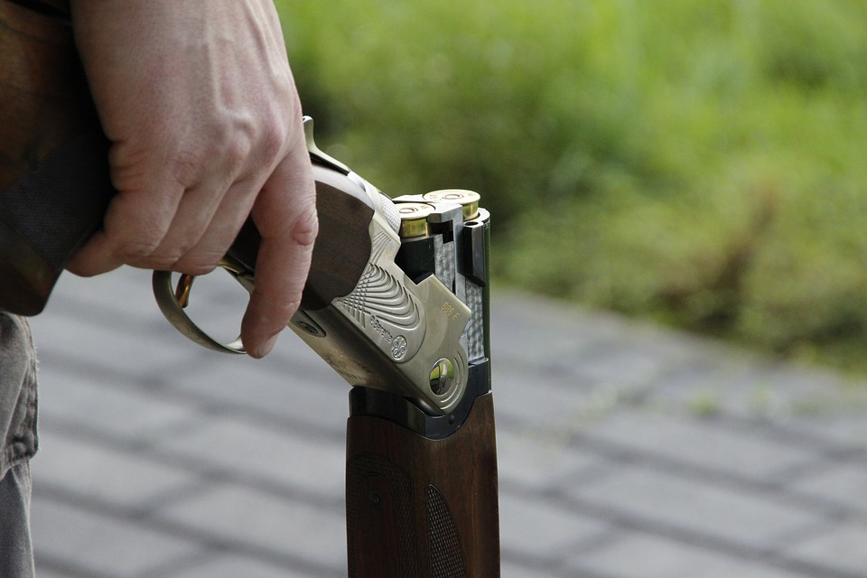 Shotgun in hand