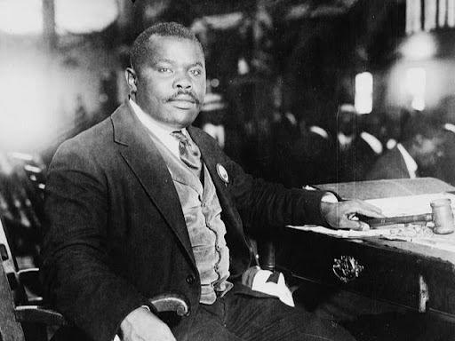marcus garvey sitting down 