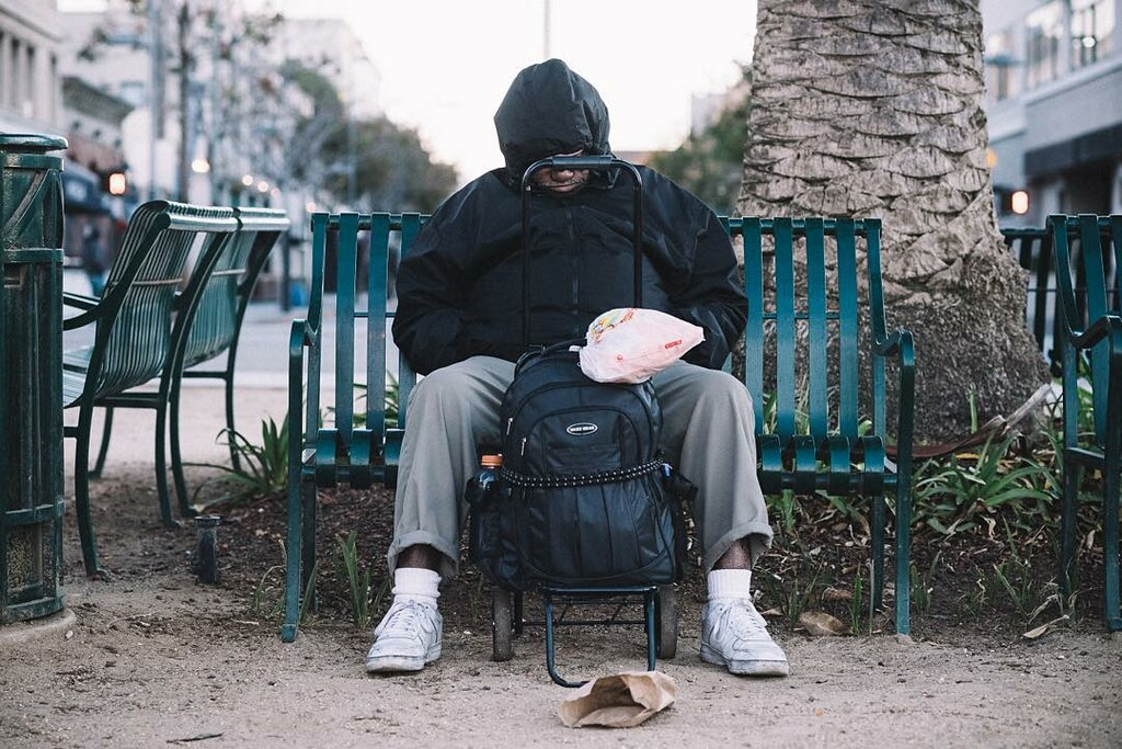 Man sitting on park bench