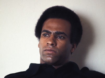 huey newton looking off into the distance 