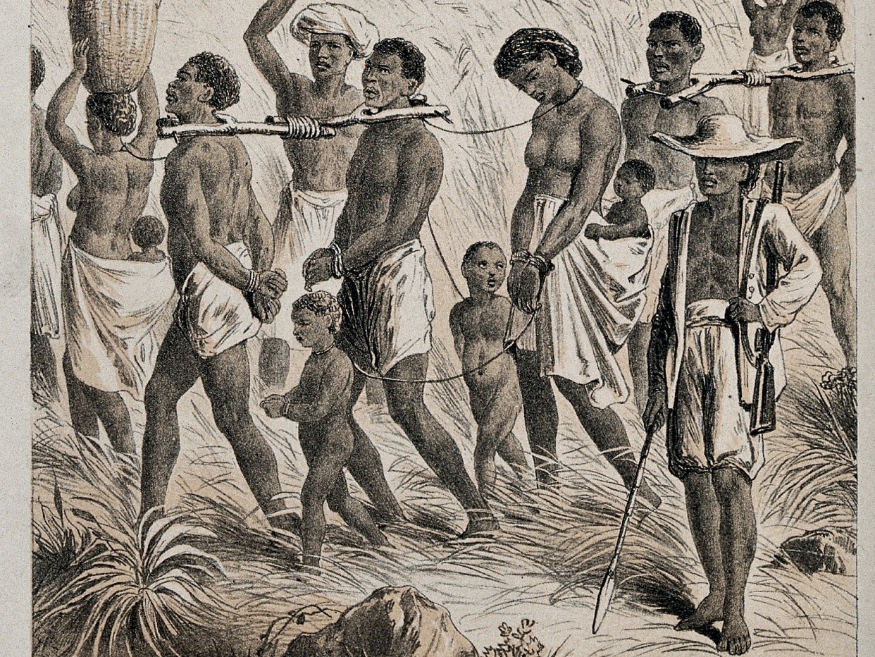 Group of men, women and children being taken to a slave market