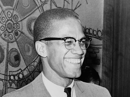 malcolm x smiling