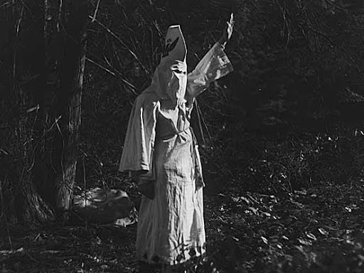 KKK member in full robes 