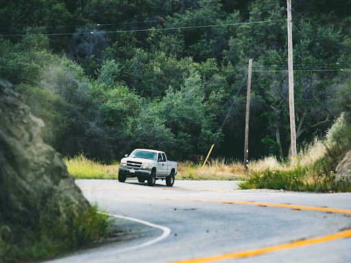 truck driving on winding road