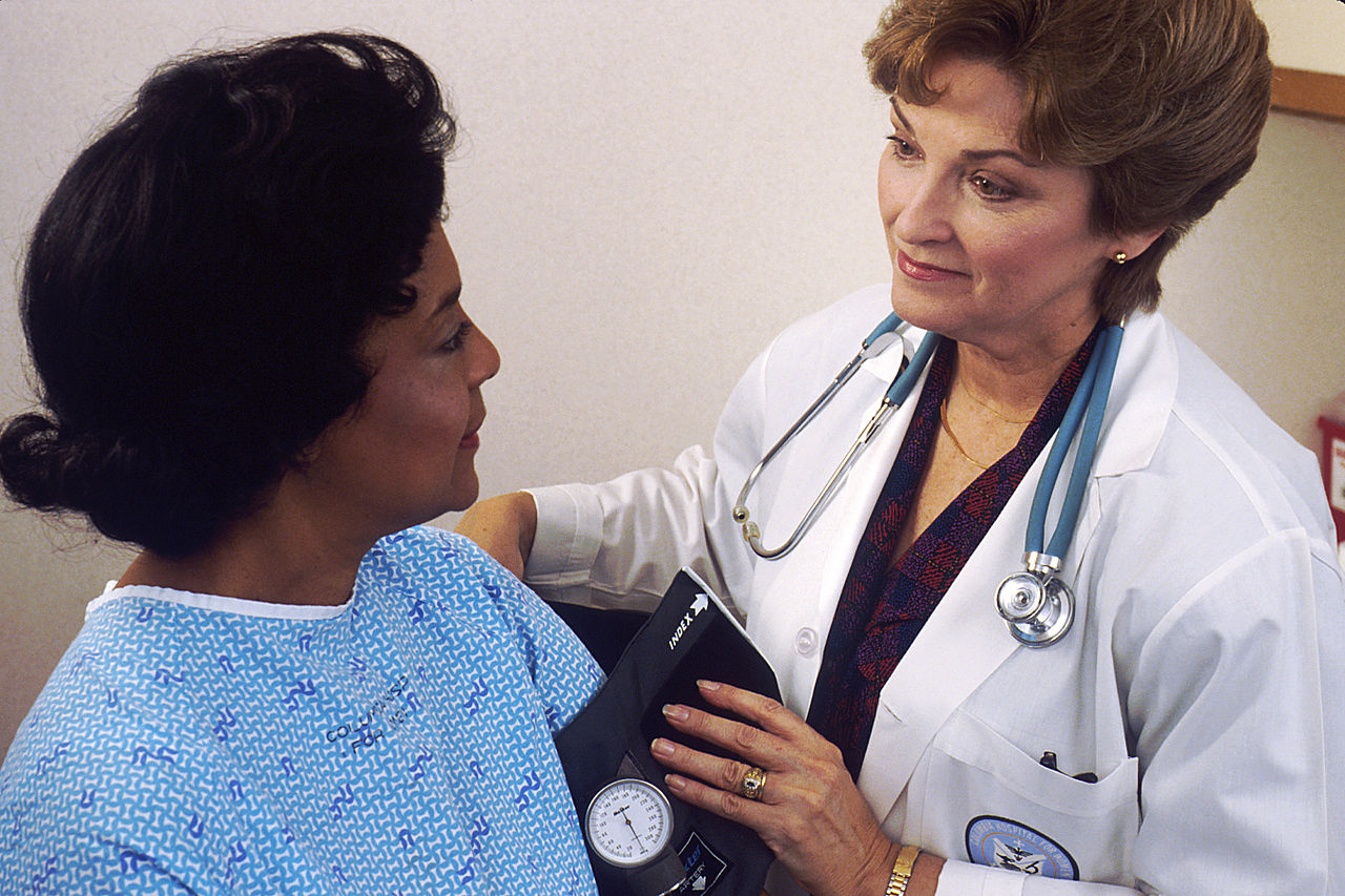 Doctor takes blood pressure