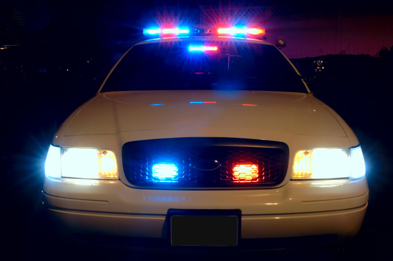 Cop car with lights on