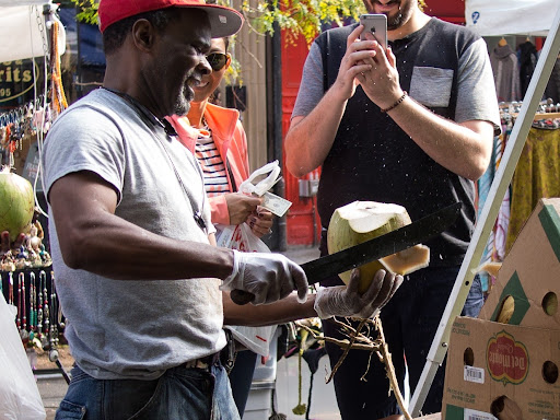 Street vendor selling coconut