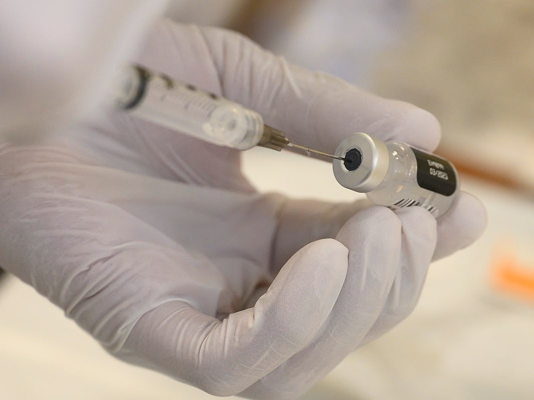 Vaccine and syringe