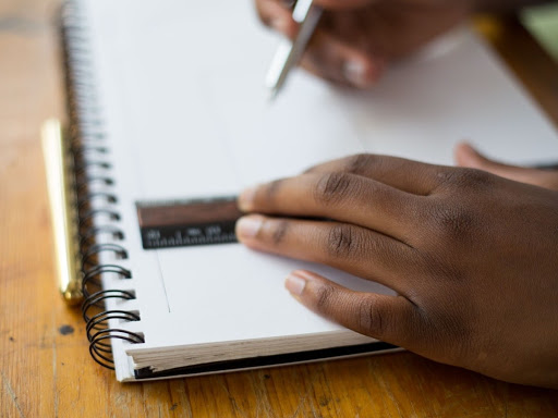 Hand writing in notebook