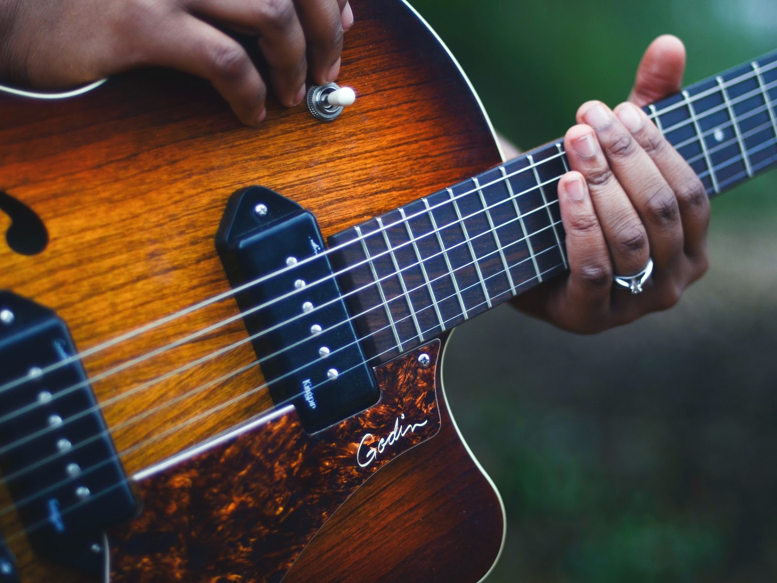 Musician holding guitar 