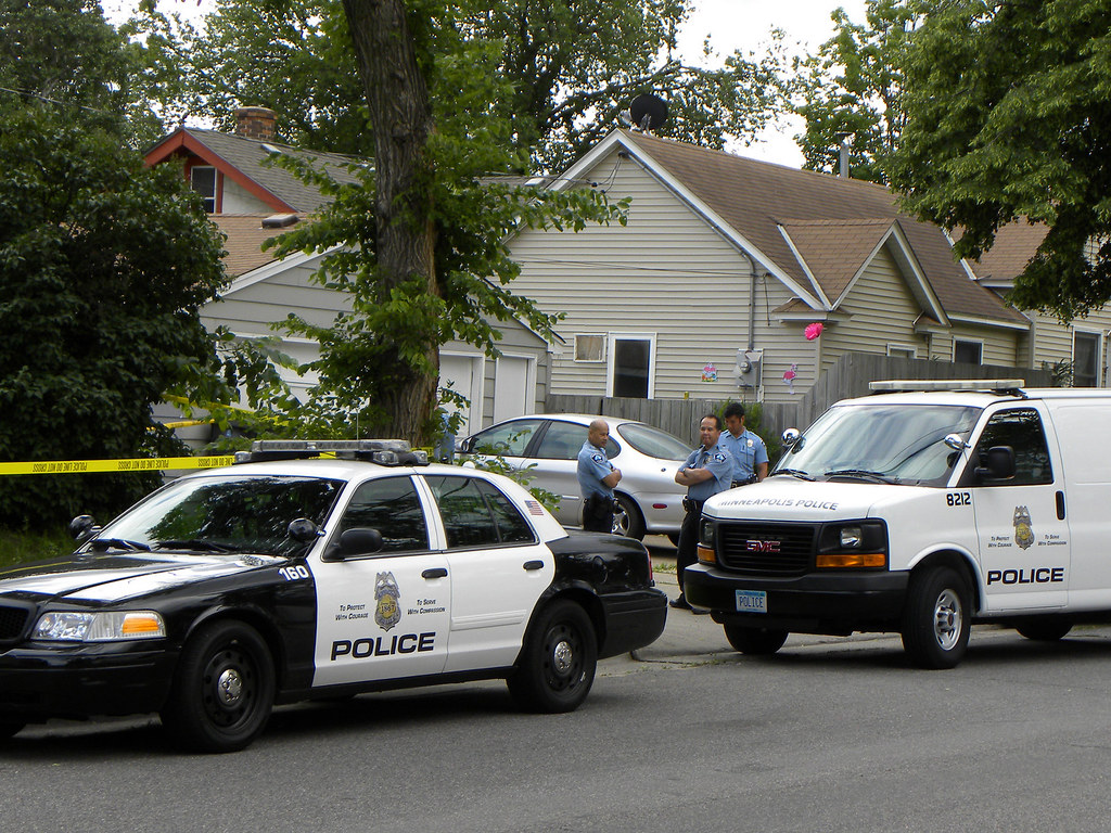 Police cop cars parked in front on home