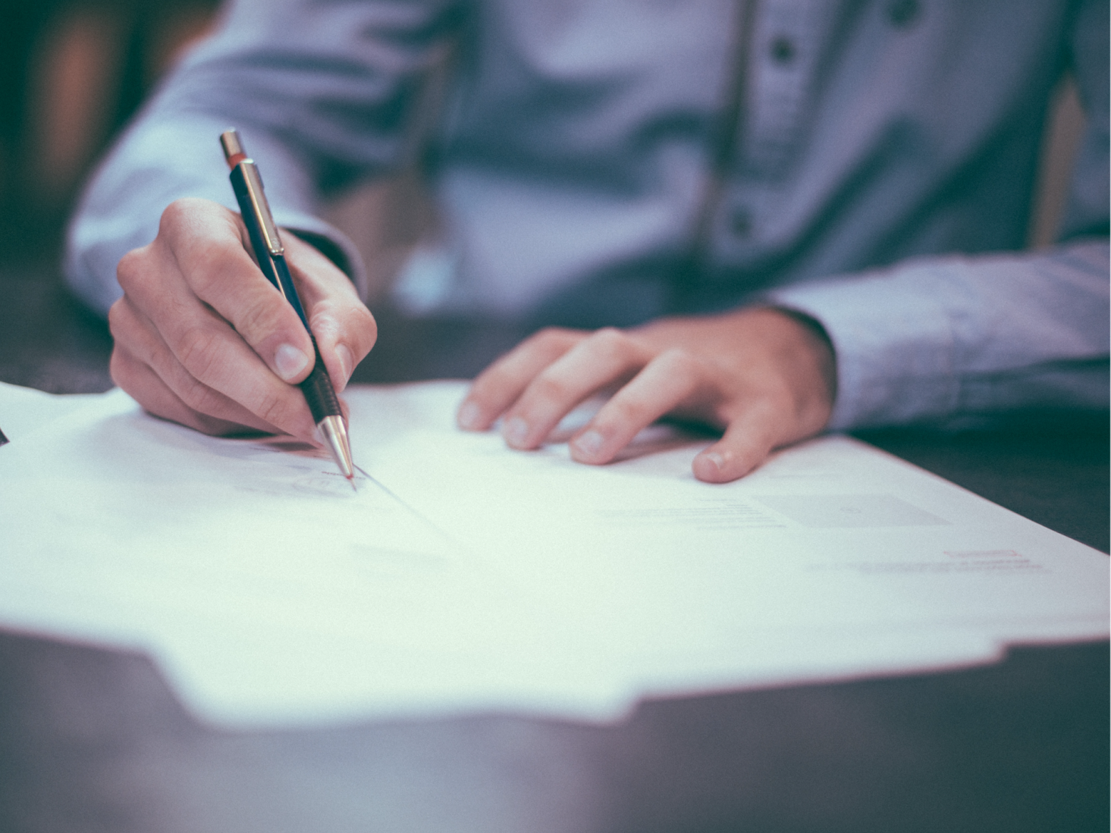 Man writing on paper