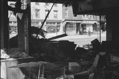 broken shop window from riot damage 