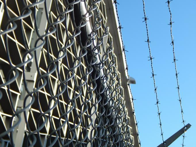Barb wire on a fence