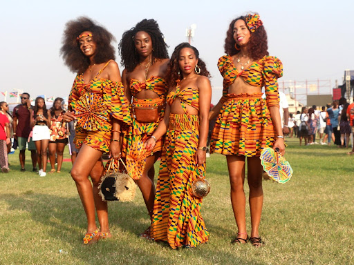 group of women in african clothing standing together 