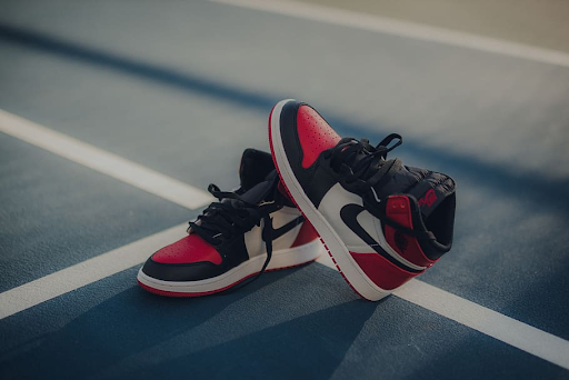 Pair of Nikes on a basketball court