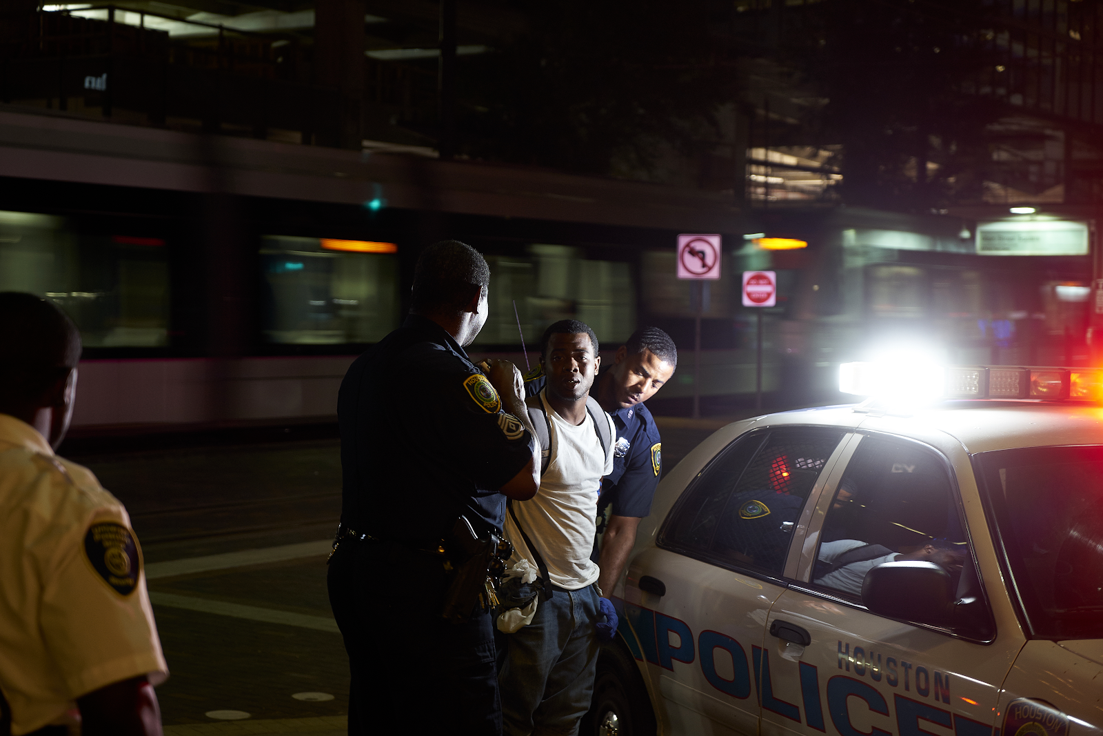Houston Police arresting young man 