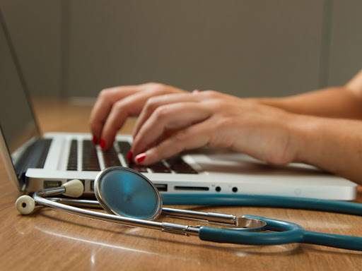person typing on the computer