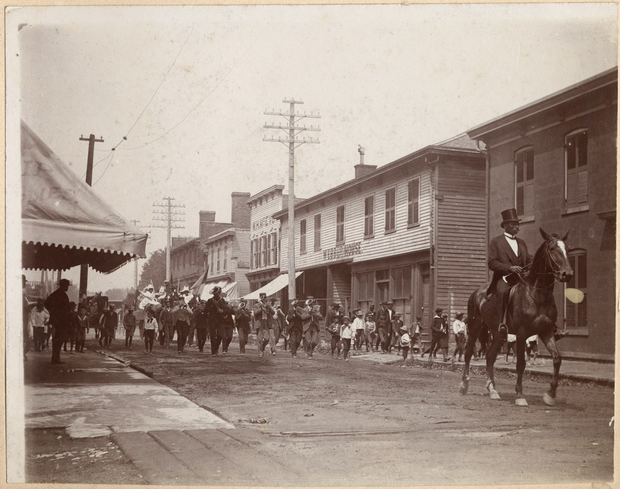 Black and white photo of parade