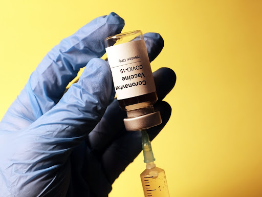 Syringe in vaccination bottle