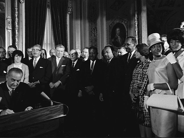 Lyndon Johnson signs Voting Rights Act of 1965