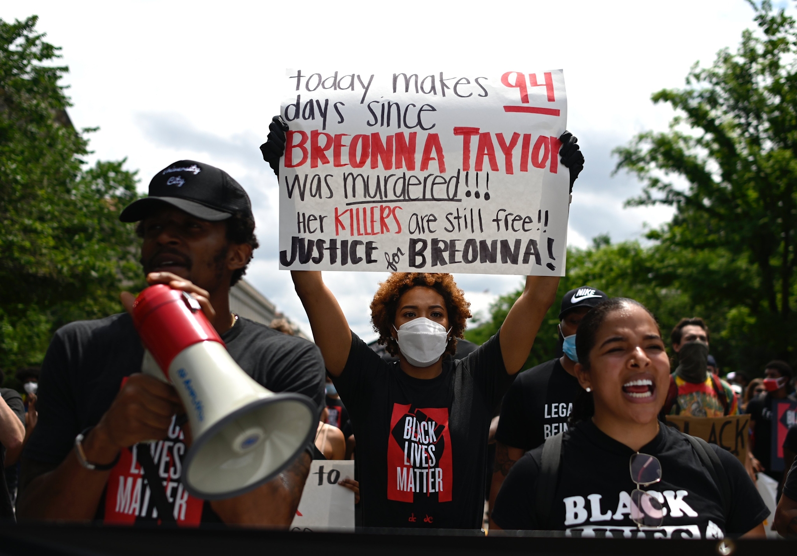 Protester with a sign about Breonna Taylor