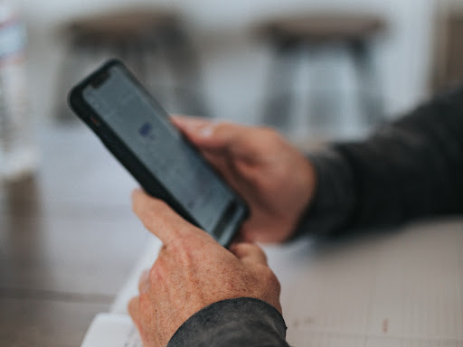 person holding a cell phone 