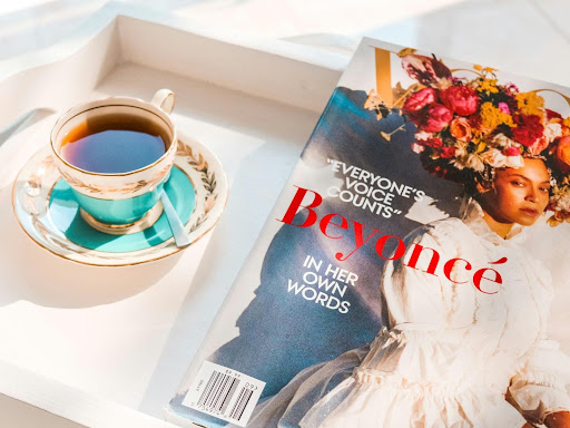 beyonce magazine near a tea cup