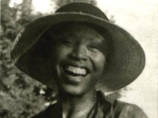 zora neale huston smiling