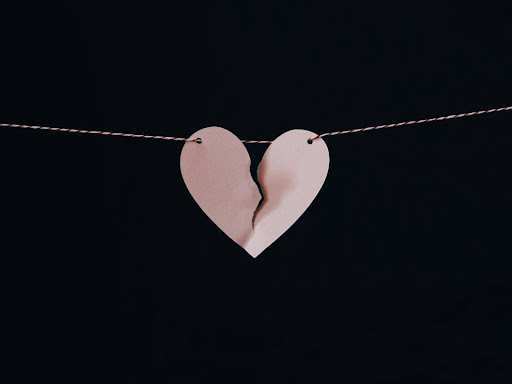 broken heart hanging on wire