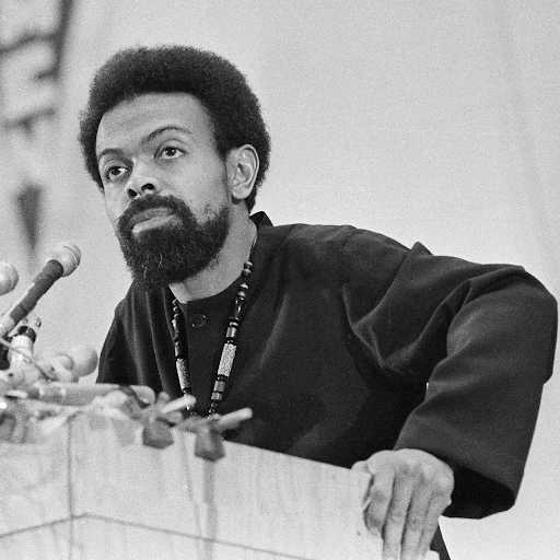 amiri baraka speaking into a microphone