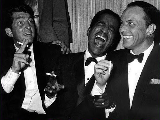 men standing together and laughing