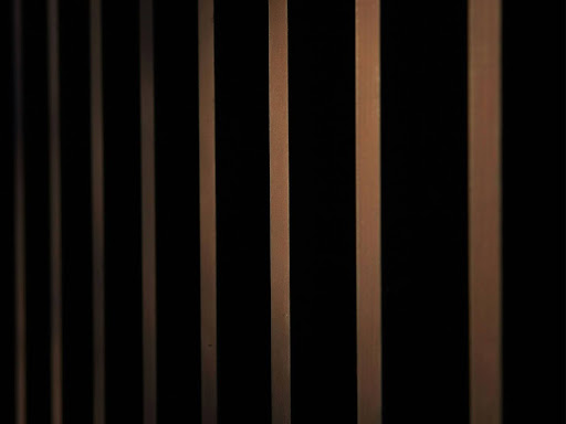  bars in a jail cell