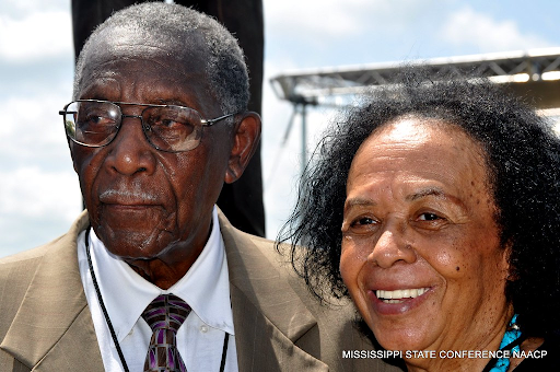 two people standing together