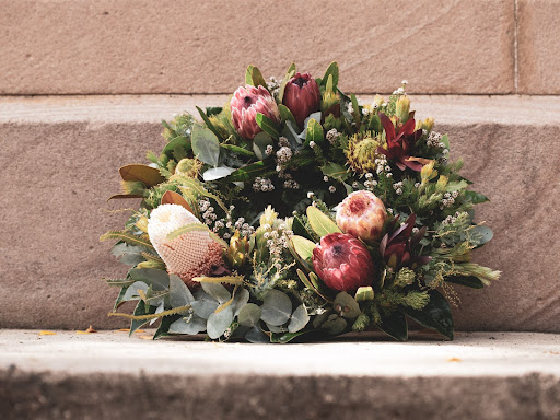 bushel of flowers on steps 