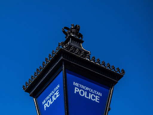 light pole that says metropolitan police 