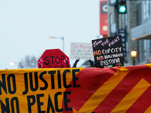 protest banner that says no just no peace
