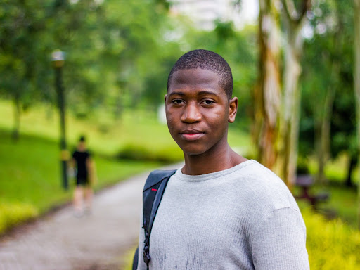 young black boy looking straight ahead