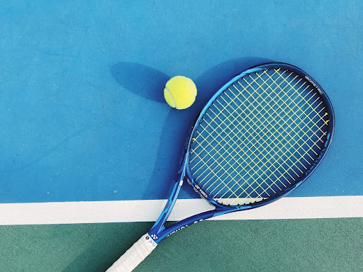 tennis racket on court