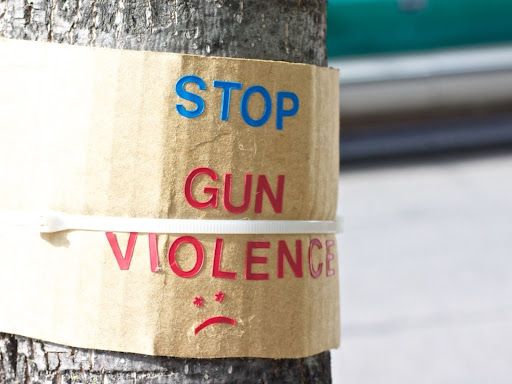 sign that says stop gun violence