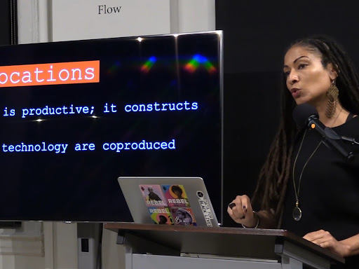 person in front of a computer presenting
