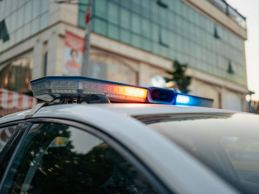 a close up of a police car with its lights on