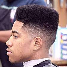 young black man with a fade haircut