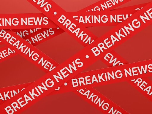 banners that says breaking news